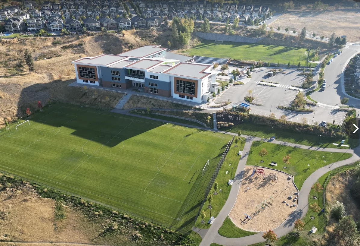 Aerial view of the school, sports fields and park near 321 Stellar Drive